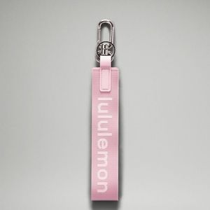 Lululemon Never Lost Keychain- Pink Peony/White Opal NEW WITH TAGS
